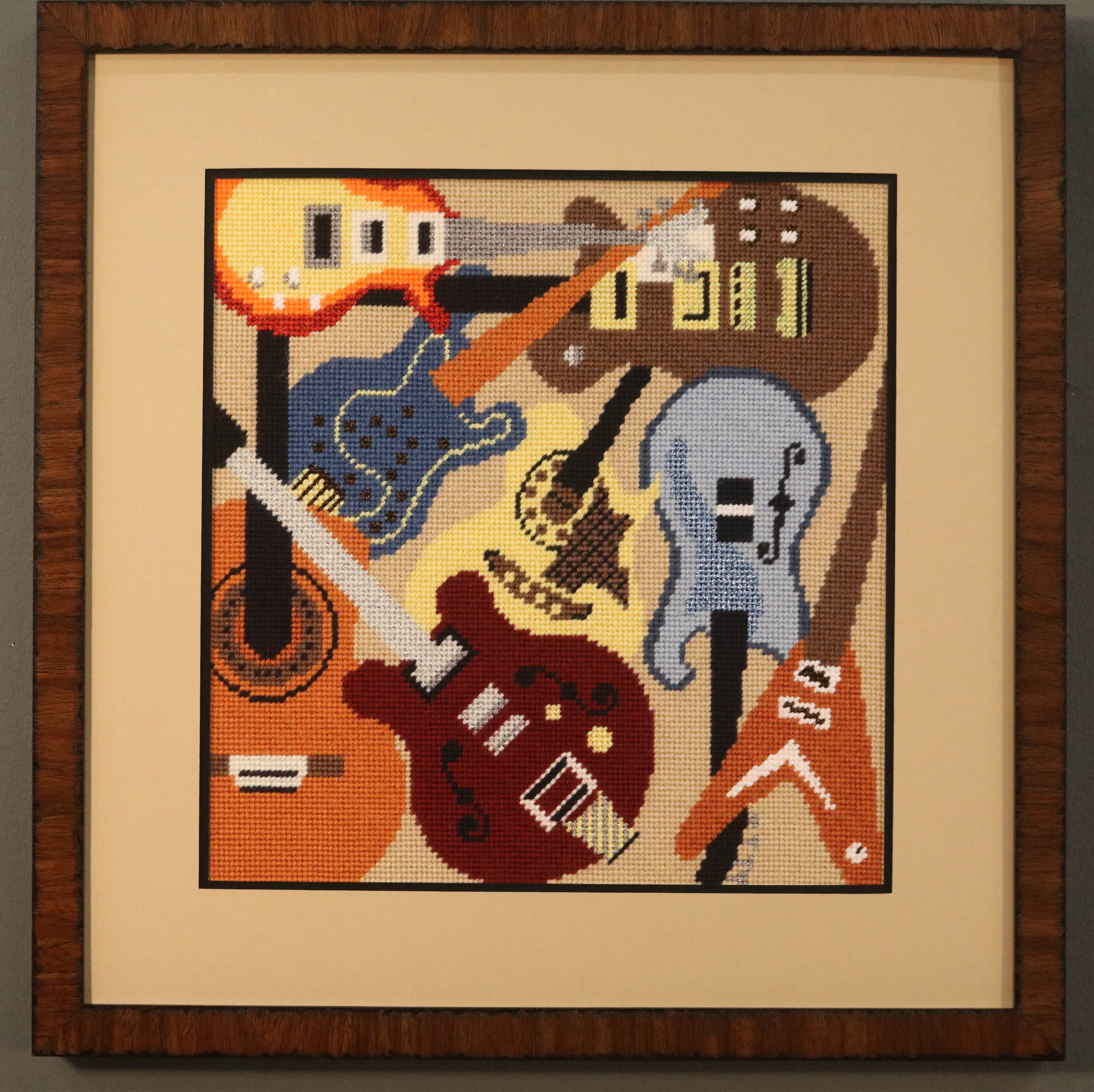 Framed Needlepoint of guitars